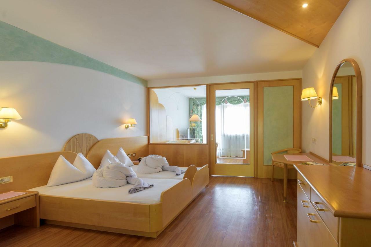Glanzhof Hotel & Apartments Марленго Стая снимка